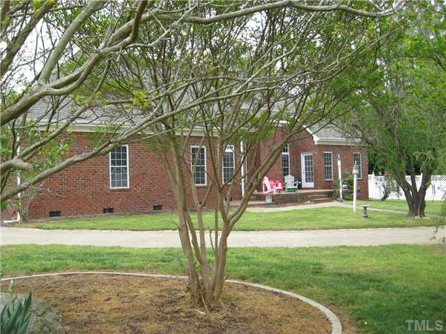 1001 Fieldgrass Place Raleigh, NC 27603 - Photo 15 of 20 REAR VIEW, RAISED PATIO WITH A LOWER LEVEL PATIO Exterior Back