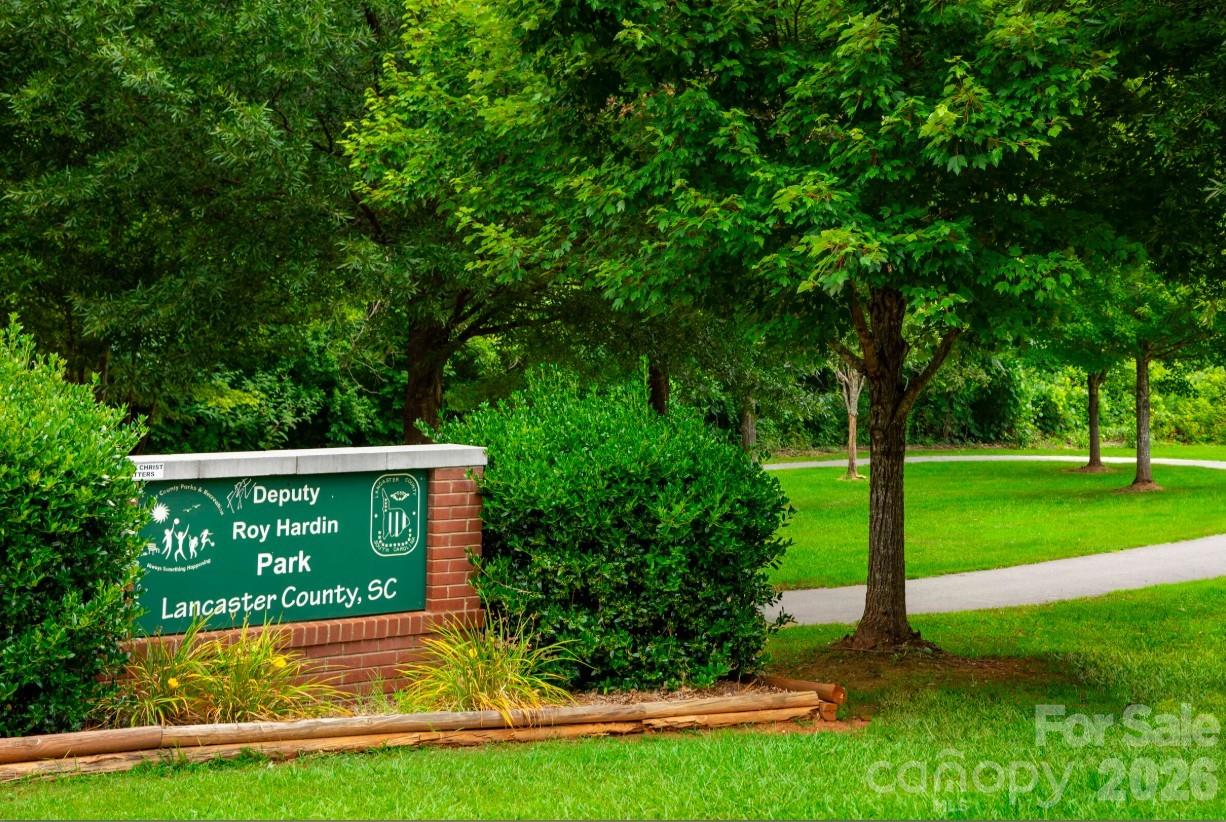 2283 Flicker Road, Unit 1050C Indian Land, SC 29707 - Photo 14 of 17 a view of a house with a yard