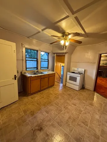 a view of kitchen with furniture and a kitchen view