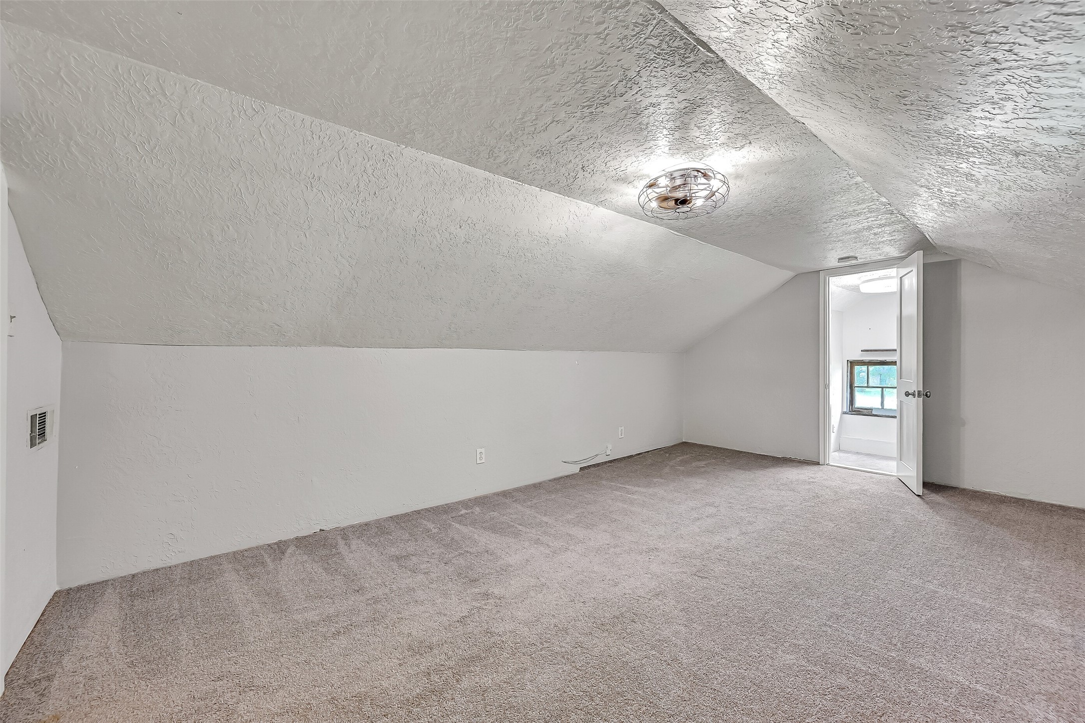 16724 Harkey Road Pearland, TX 77584 - Photo 22 of 34 The upstairs loft area has tons of possibilities! Game room, second living, bedroom, even air-conditioned storage space … what can you imagine here?