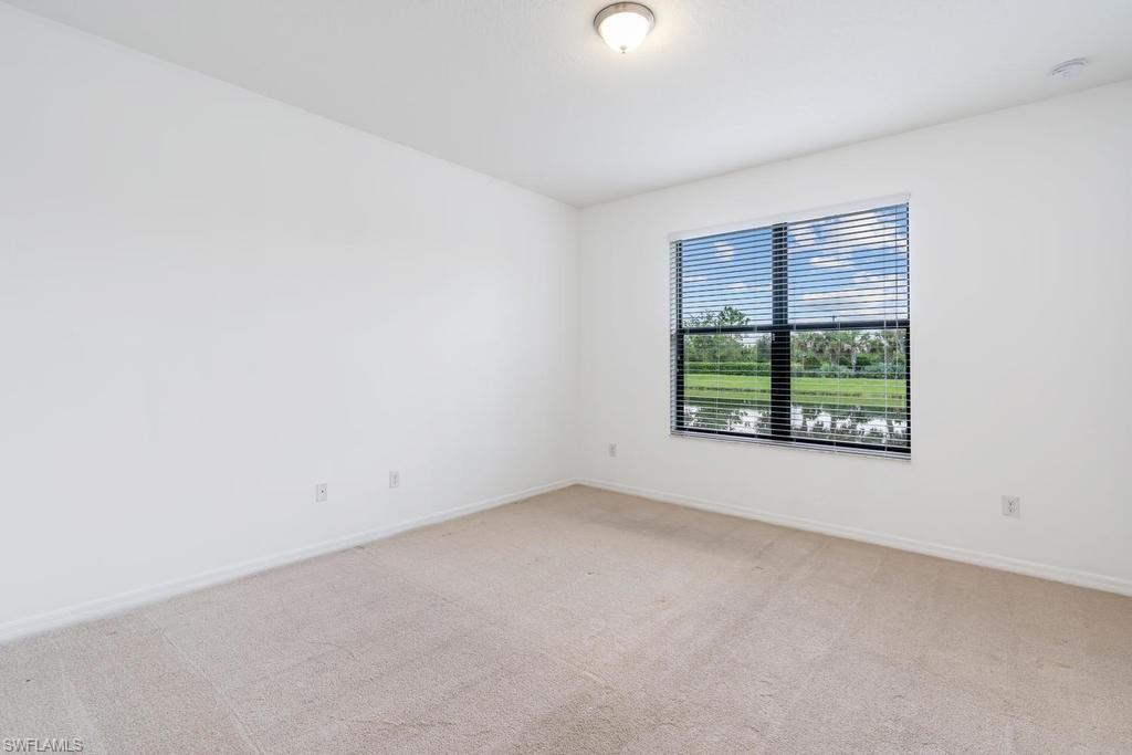 5423 Useppa Drive Ave Maria, FL 34142 - Photo 16 of 35 an empty room with a window