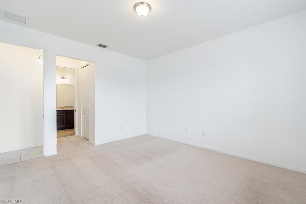 5423 Useppa Drive Ave Maria, FL 34142 - Photo 17 of 35 an empty room with an entryway