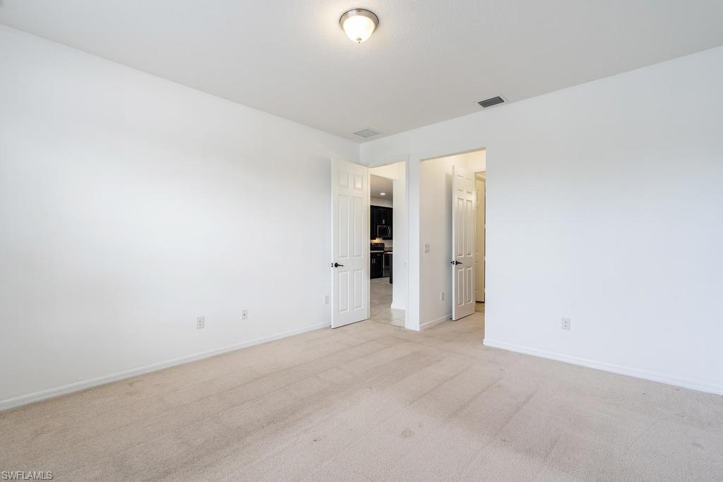 5423 Useppa Drive Ave Maria, FL 34142 - Photo 18 of 35 a view of an empty room