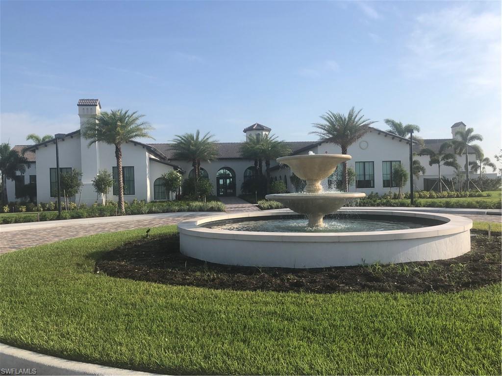 5423 Useppa Drive Ave Maria, FL 34142 - Photo 21 of 35 a view of a house with a swimming pool