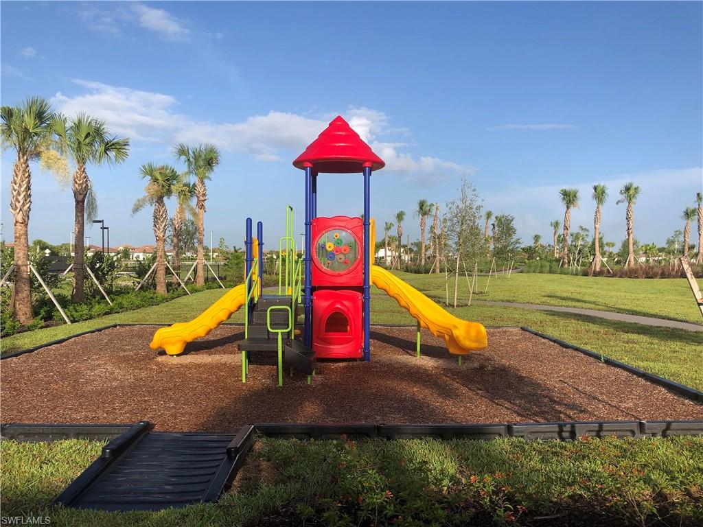 5423 Useppa Drive Ave Maria, FL 34142 - Photo 34 of 35 a view of a park with large trees