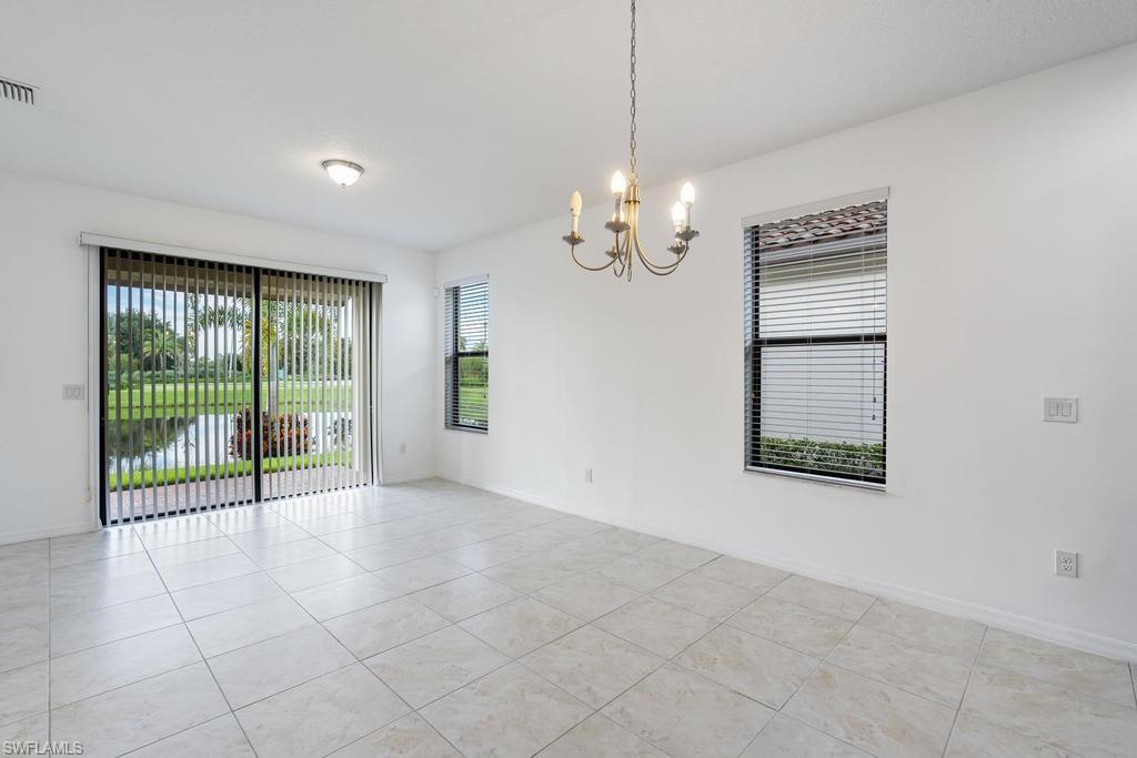 5423 Useppa Drive Ave Maria, FL 34142 - Photo 7 of 35 a view of an empty room with a window