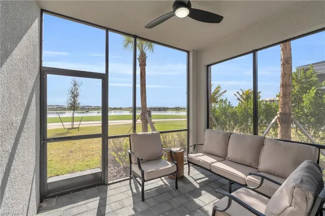 a view of a balcony with chairs