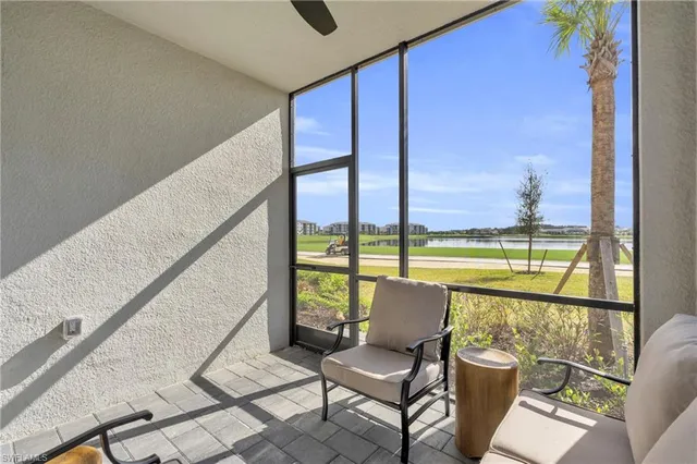 a view of a swimming pool with a lake view