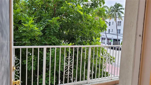 a bathroom with a sink mirror and toilet