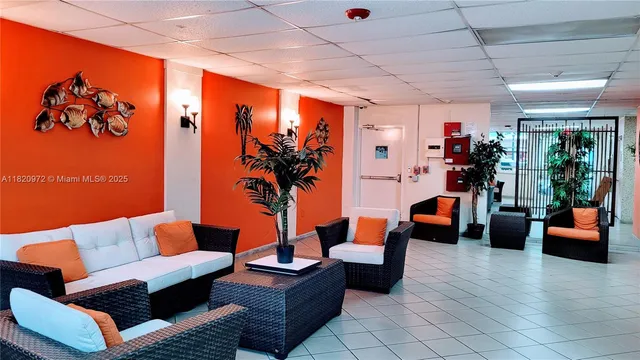 a outdoor living space with furniture and a potted plant