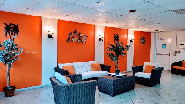 a outdoor living space with furniture and a potted plant