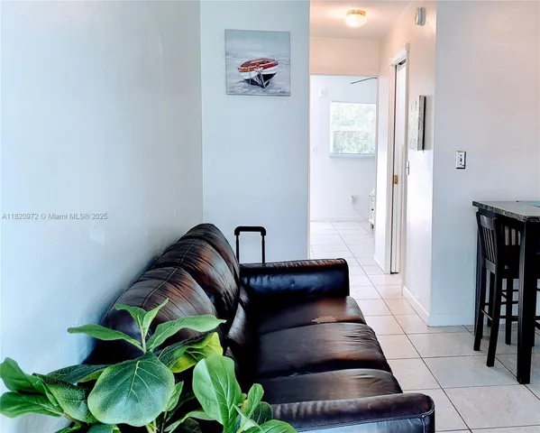 a view of entryway with livingroom and furniture