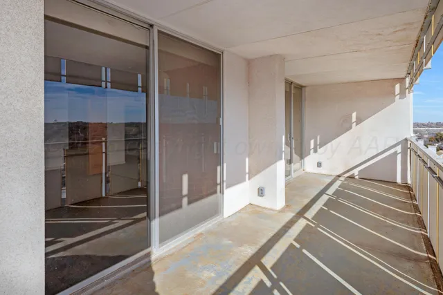 a bathroom with a tub and shower