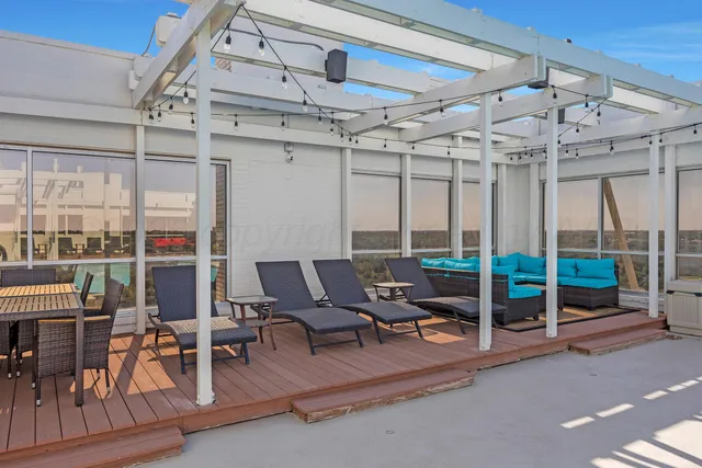 a outdoor space with lots of tables and chairs