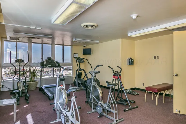 a view of a room with gym equipment