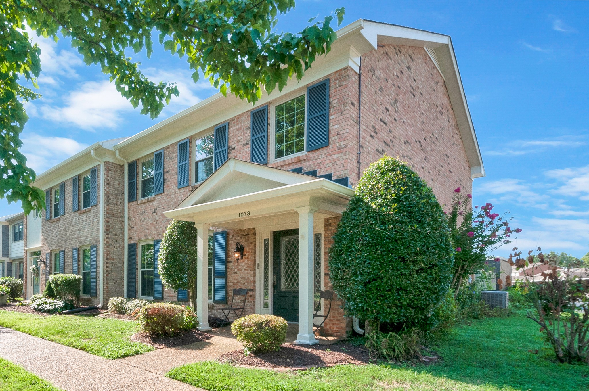 1078 General George Patton Road Nashville, TN 37221 - Photo 2 of 33 front view of a house with a yard