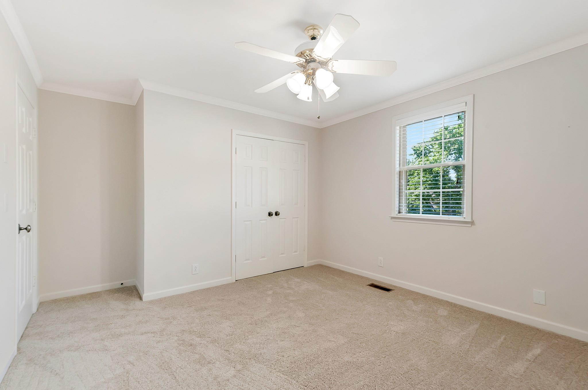 1078 General George Patton Road Nashville, TN 37221 - Photo 26 of 33 an empty room with windows and ceiling fan