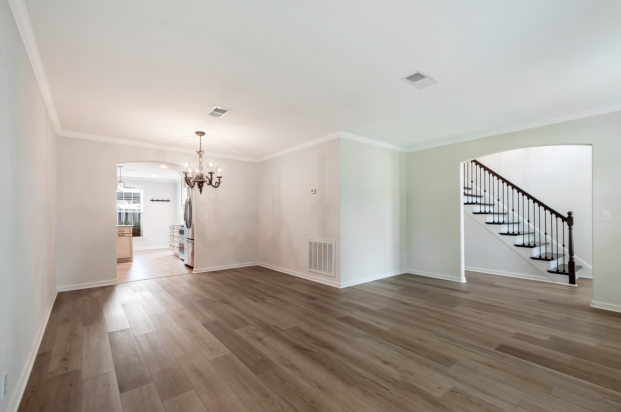 1078 General George Patton Road Nashville, TN 37221 - Photo 9 of 33 wooden floor in an empty room with a window