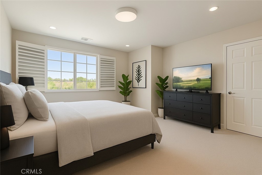 64 Full Moon Irvine, CA 92618 - Photo 1 of 1 a bedroom with a bed and window