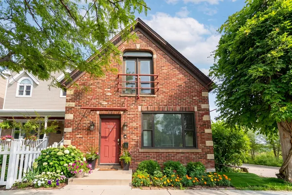 front view of a house with a small yard