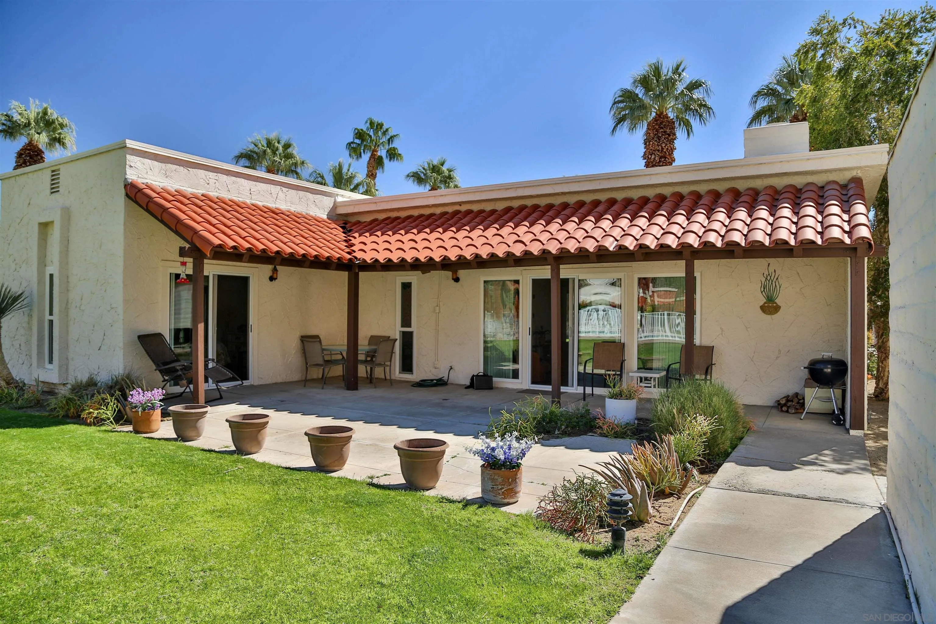 1682 Montezuma Court, Unit 13 Borrego Springs, CA 92004 - Photo 17 of 22 a view of a house with furniture and garden