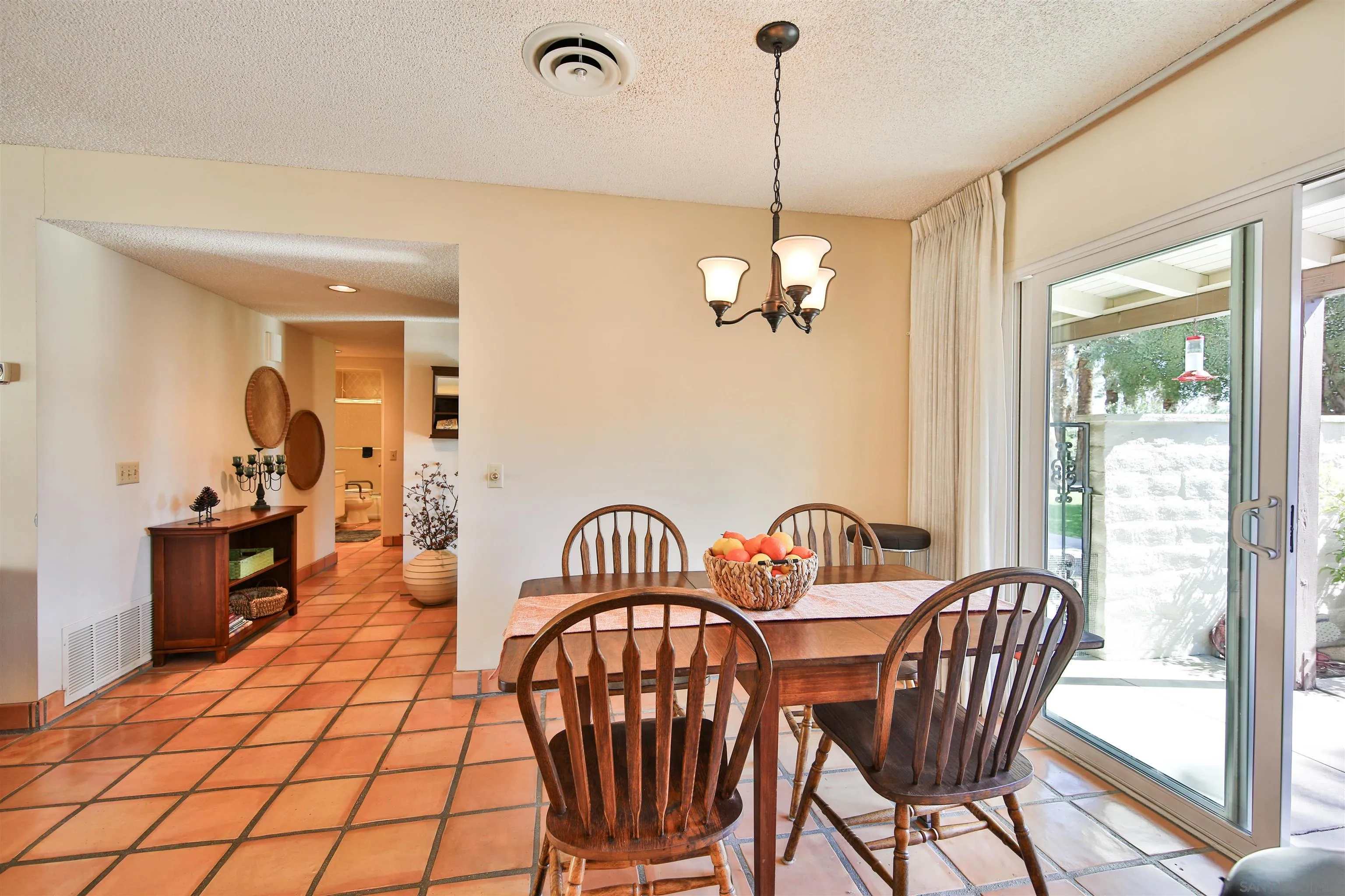 1682 Montezuma Court, Unit 13 Borrego Springs, CA 92004 - Photo 5 of 22 a view of a dining room with furniture window and outside view