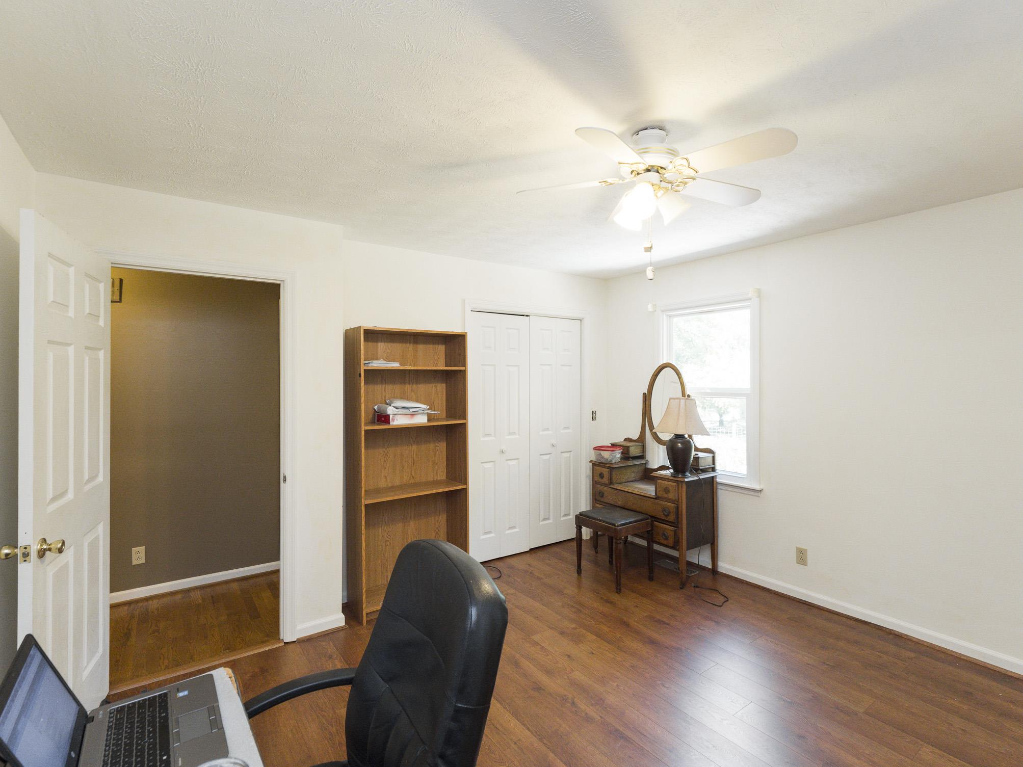 3609 Raymond Head Road Springfield, TN 37172 - Photo 20 of 30 a view of a workspace with furniture and wooden floor