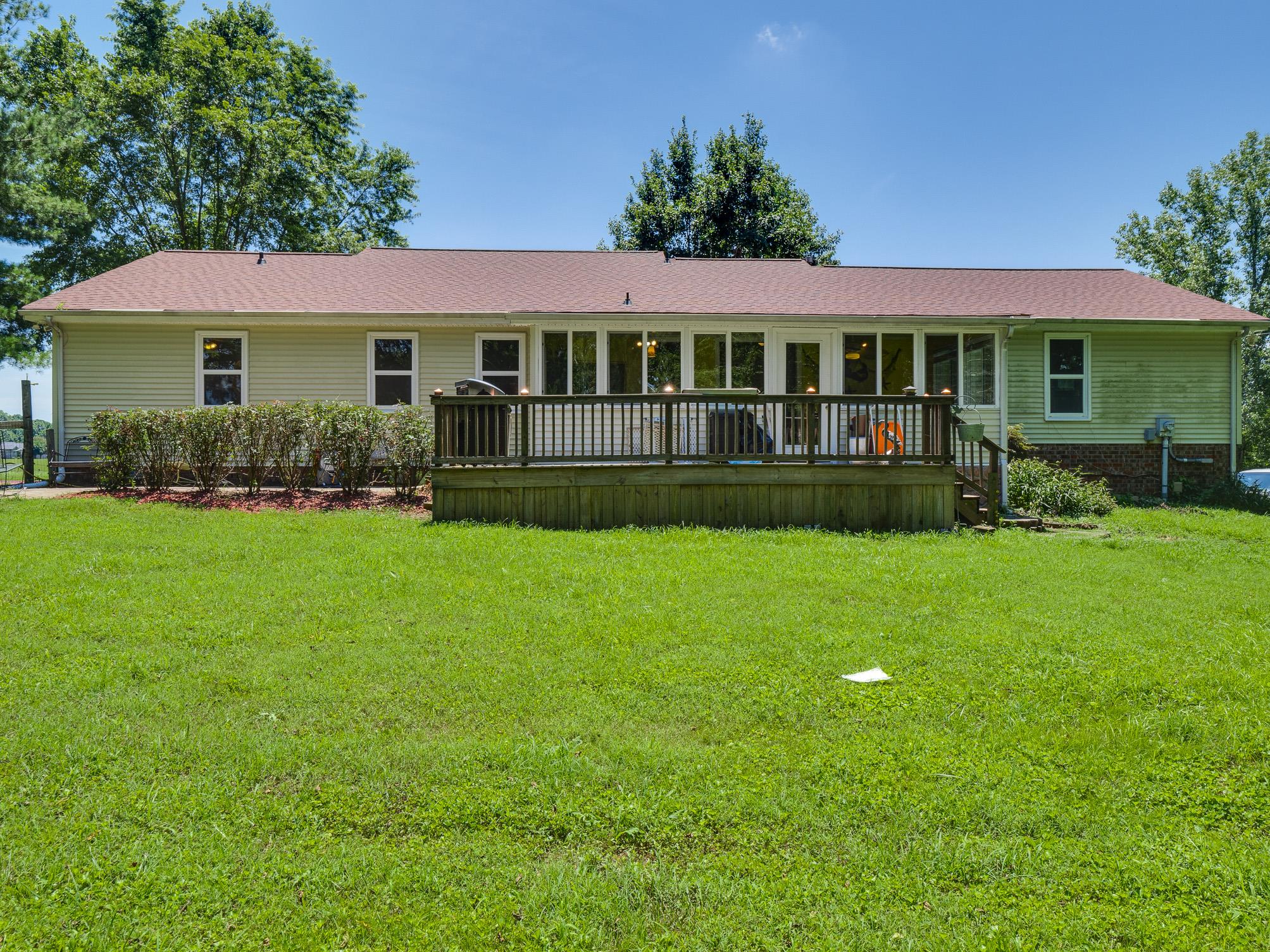 3609 Raymond Head Road Springfield, TN 37172 - Photo 30 of 30 a front view of a house with a yard table and chairs
