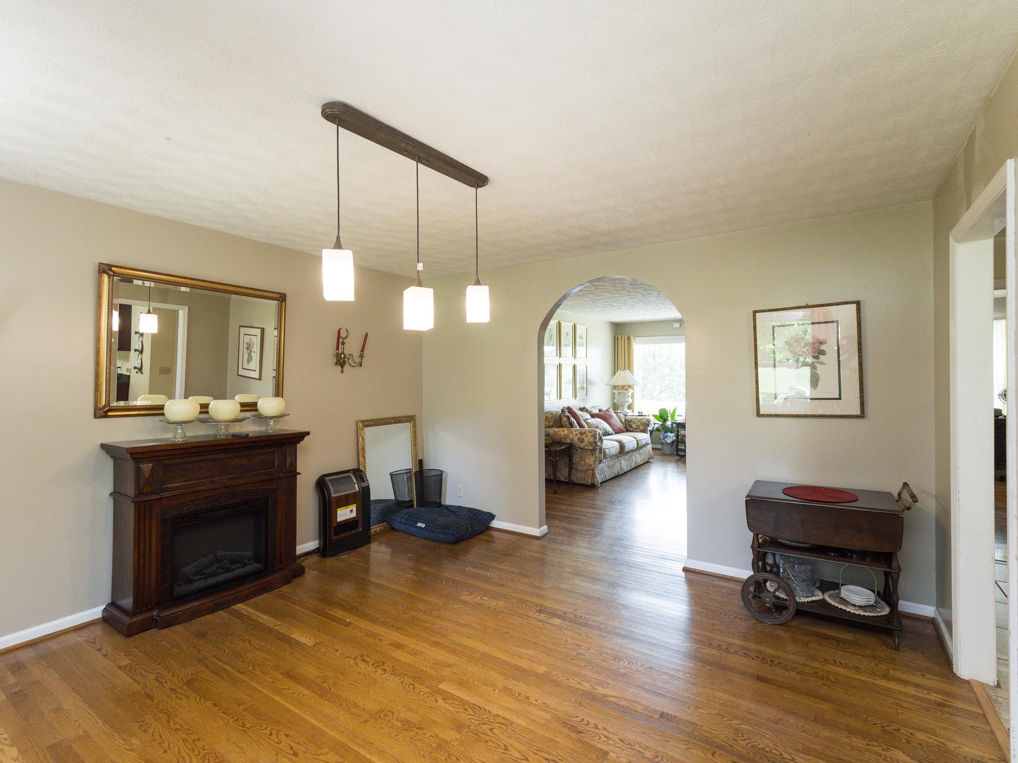 3609 Raymond Head Road Springfield, TN 37172 - Photo 6 of 30 a view of a livingroom with furniture and a fireplace