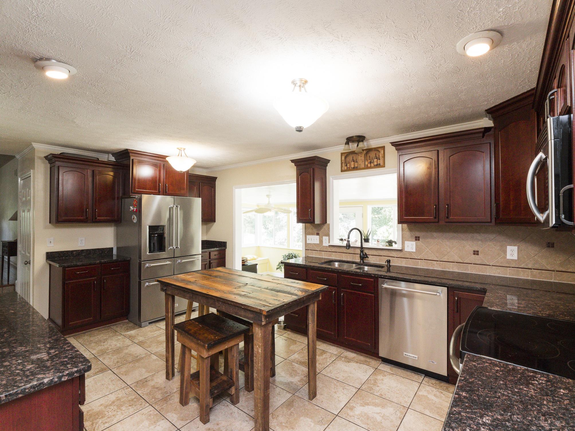 3609 Raymond Head Road Springfield, TN 37172 - Photo 8 of 30 a kitchen with a sink cabinets and stainless steel appliances