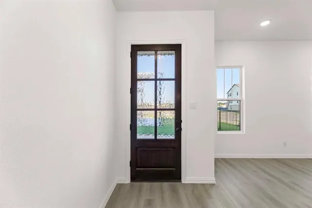 an empty room with windows