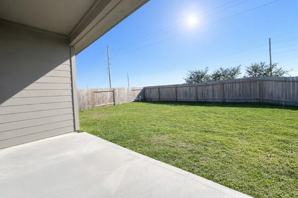 a view of a backyard with a garden