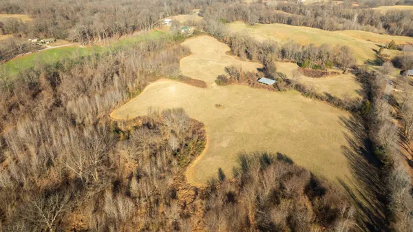 a view of a yard covered with snow