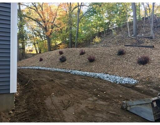 46 Berwick Road Attleboro, MA 02703 - Photo 5 of 6 a view of a dry yard with trees