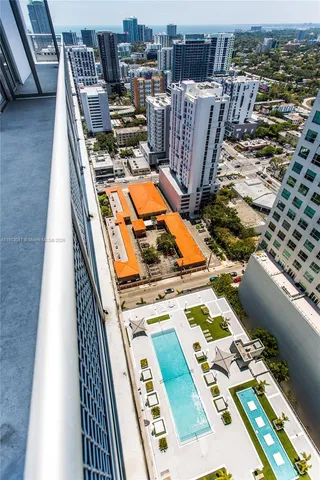 a view of roof deck with patio