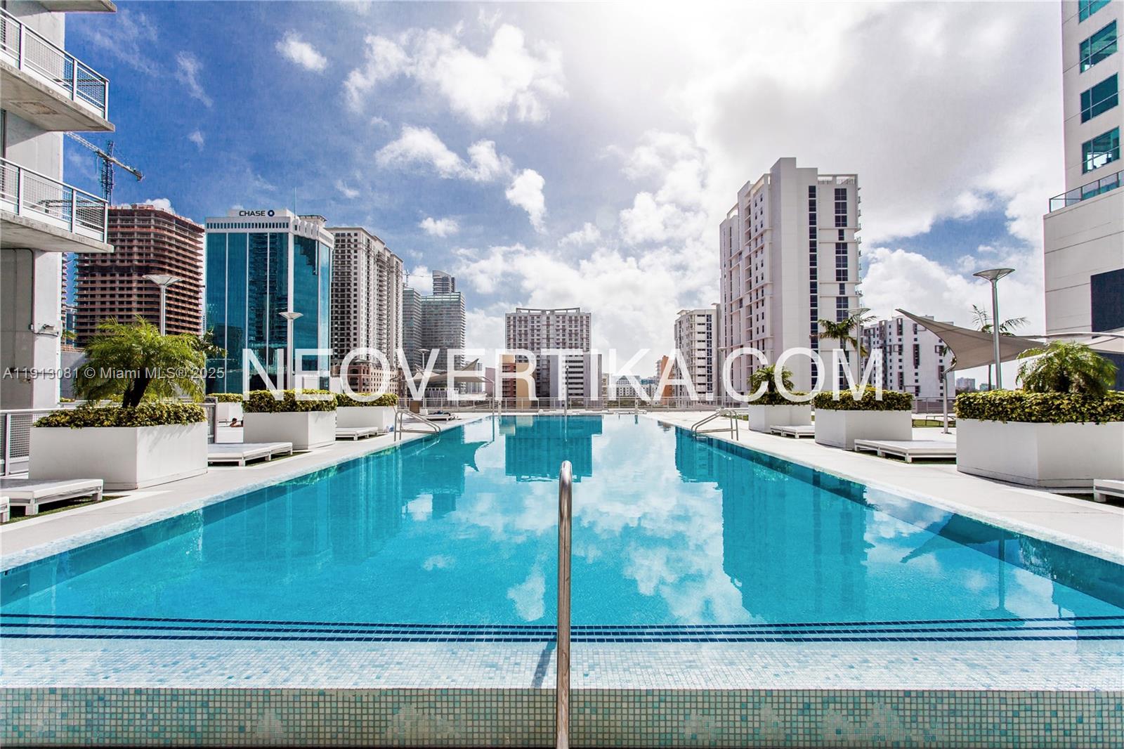 690 Southwest 1st Court, Unit PHI20 Miami, FL 33130 - Photo 16 of 21 a view of a swimming pool with outdoor seating