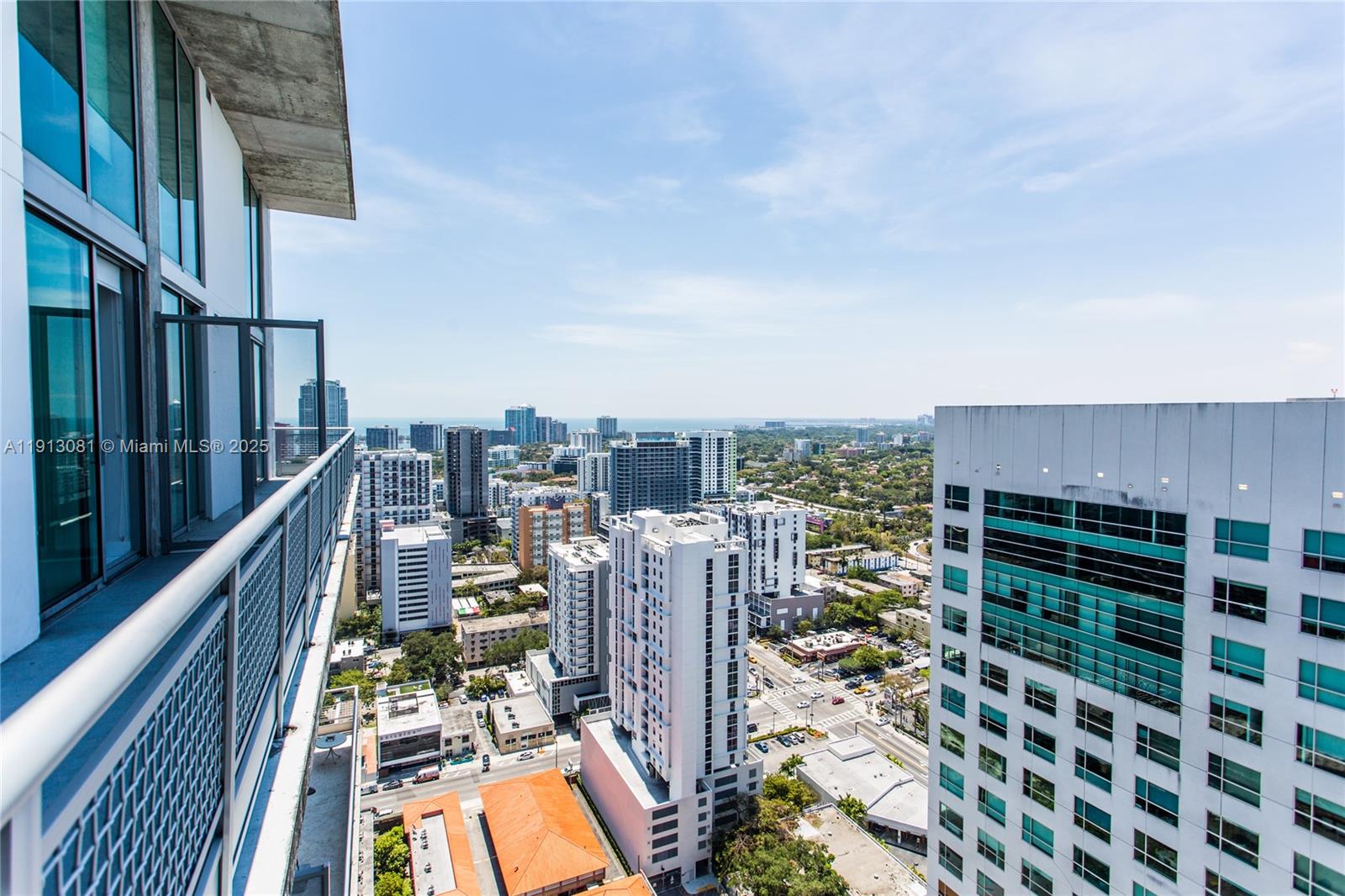 690 Southwest 1st Court, Unit PHI20 Miami, FL 33130 - Photo 10 of 21 a view of roof deck with seating space and city view