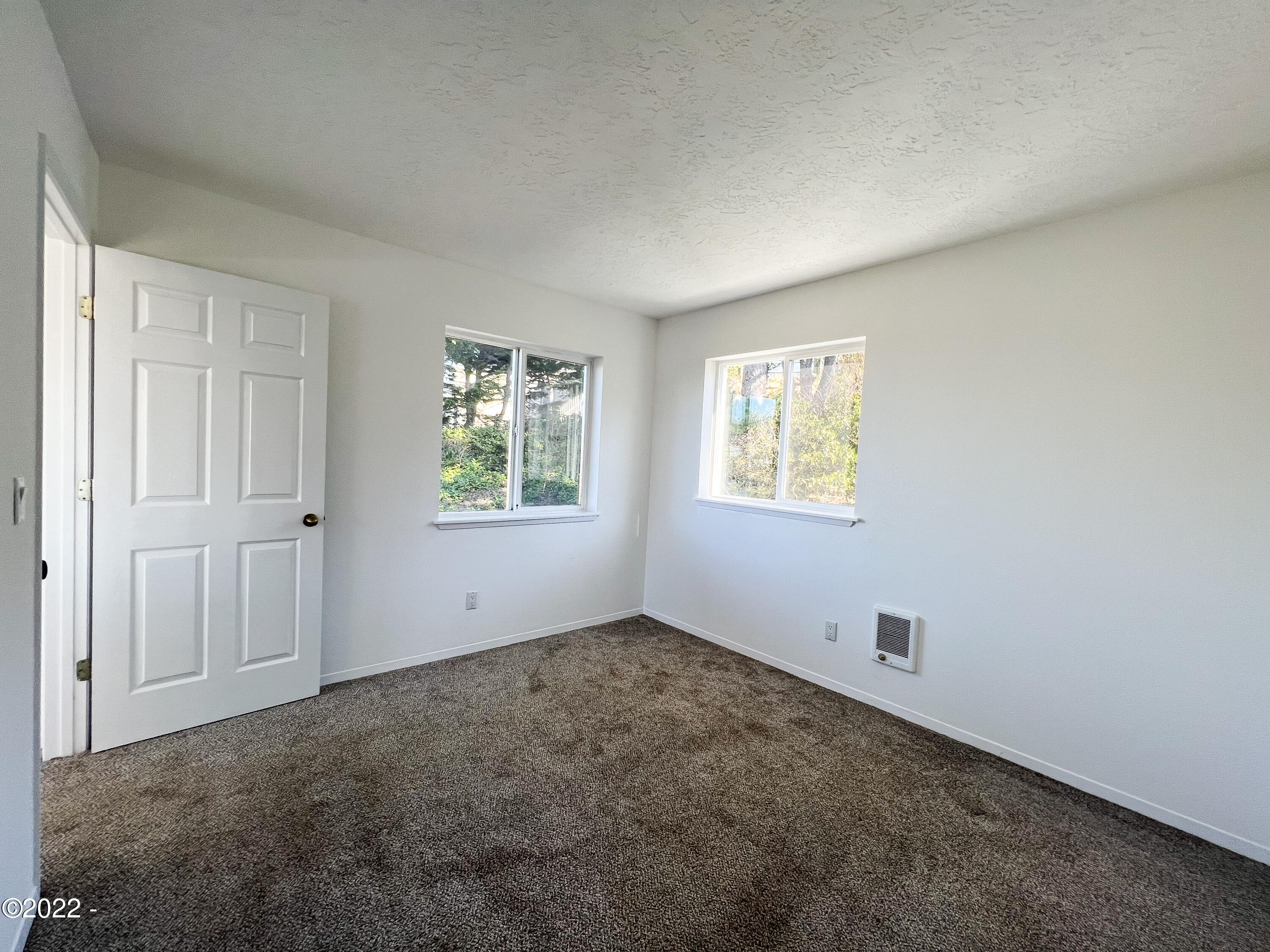 5320 Northeast Logan Road Lincoln City, OR 97367 - Photo 14 of 21 Northside bedroom