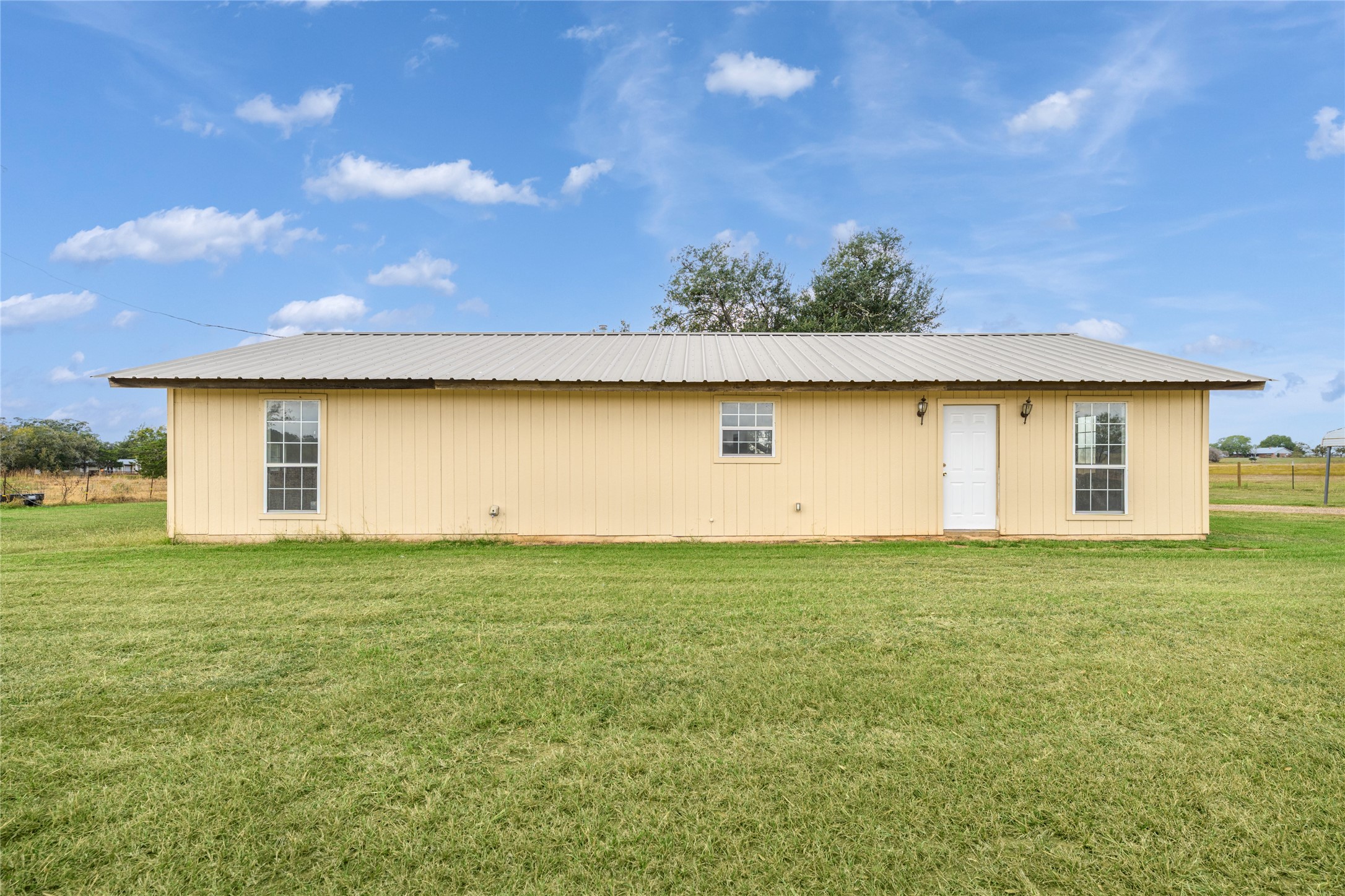 174 Easley Road Smithville, TX 78957 - Photo 11 of 28 a view of an outdoor space and a yard