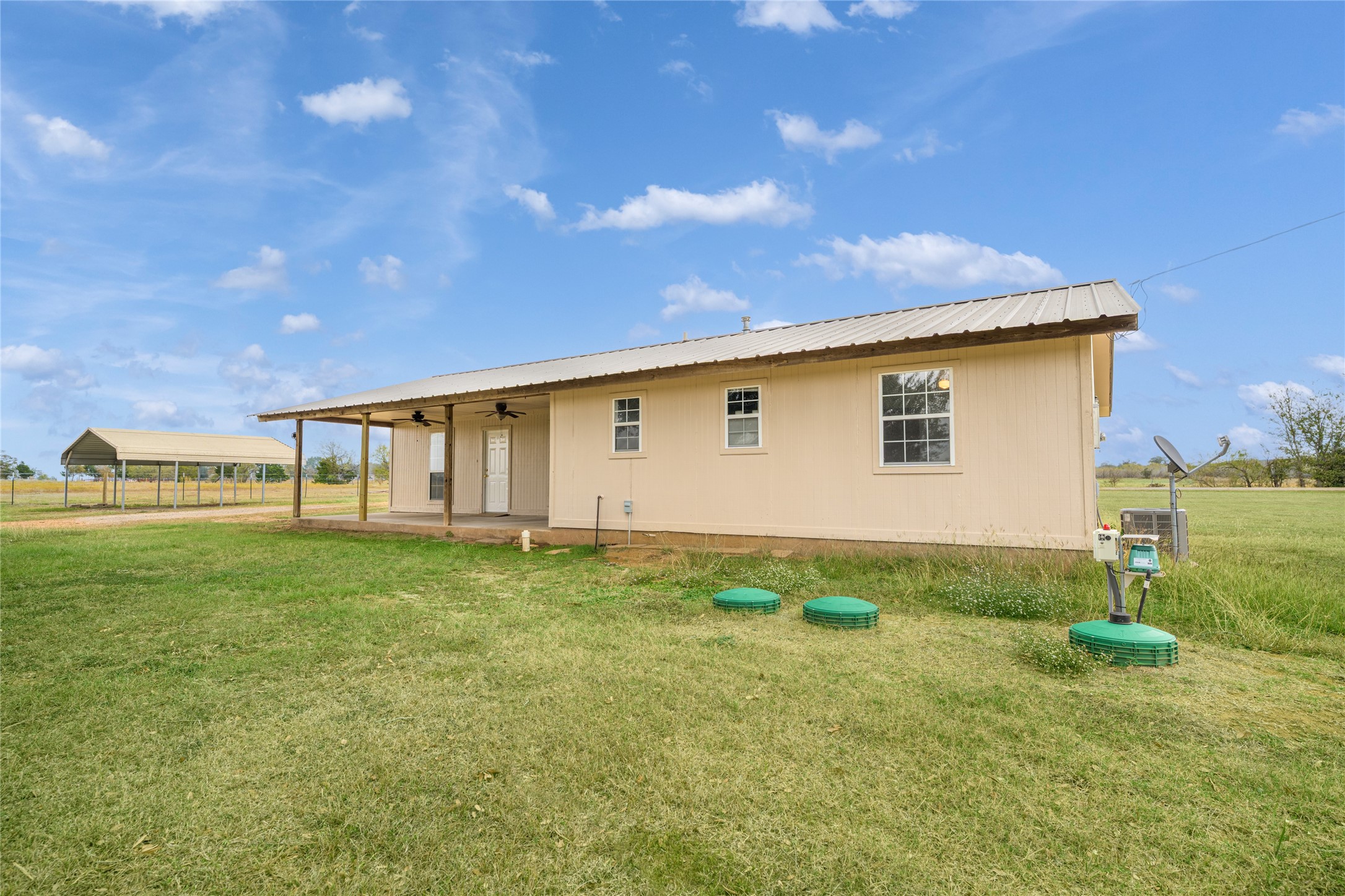 174 Easley Road Smithville, TX 78957 - Photo 14 of 28 a view of a backyard