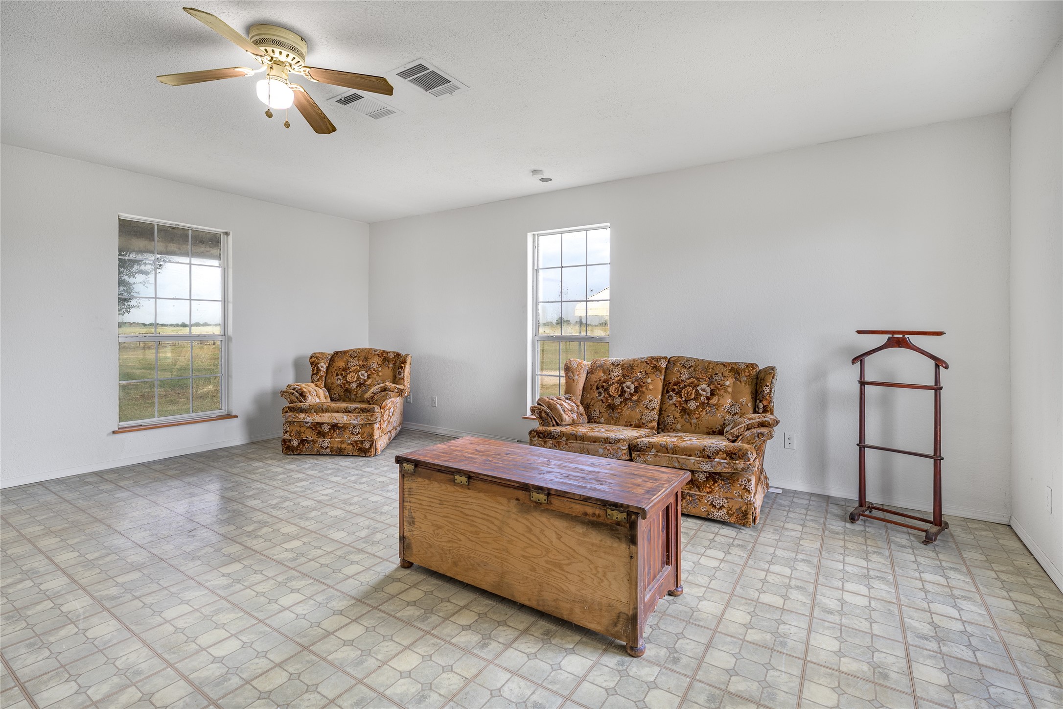 174 Easley Road Smithville, TX 78957 - Photo 17 of 28 a living room with furniture and a window