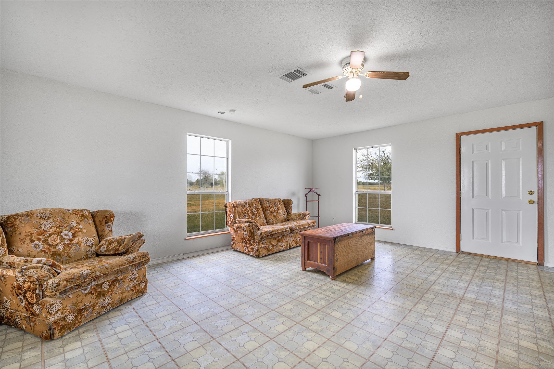 174 Easley Road Smithville, TX 78957 - Photo 18 of 28 a living room with furniture and window