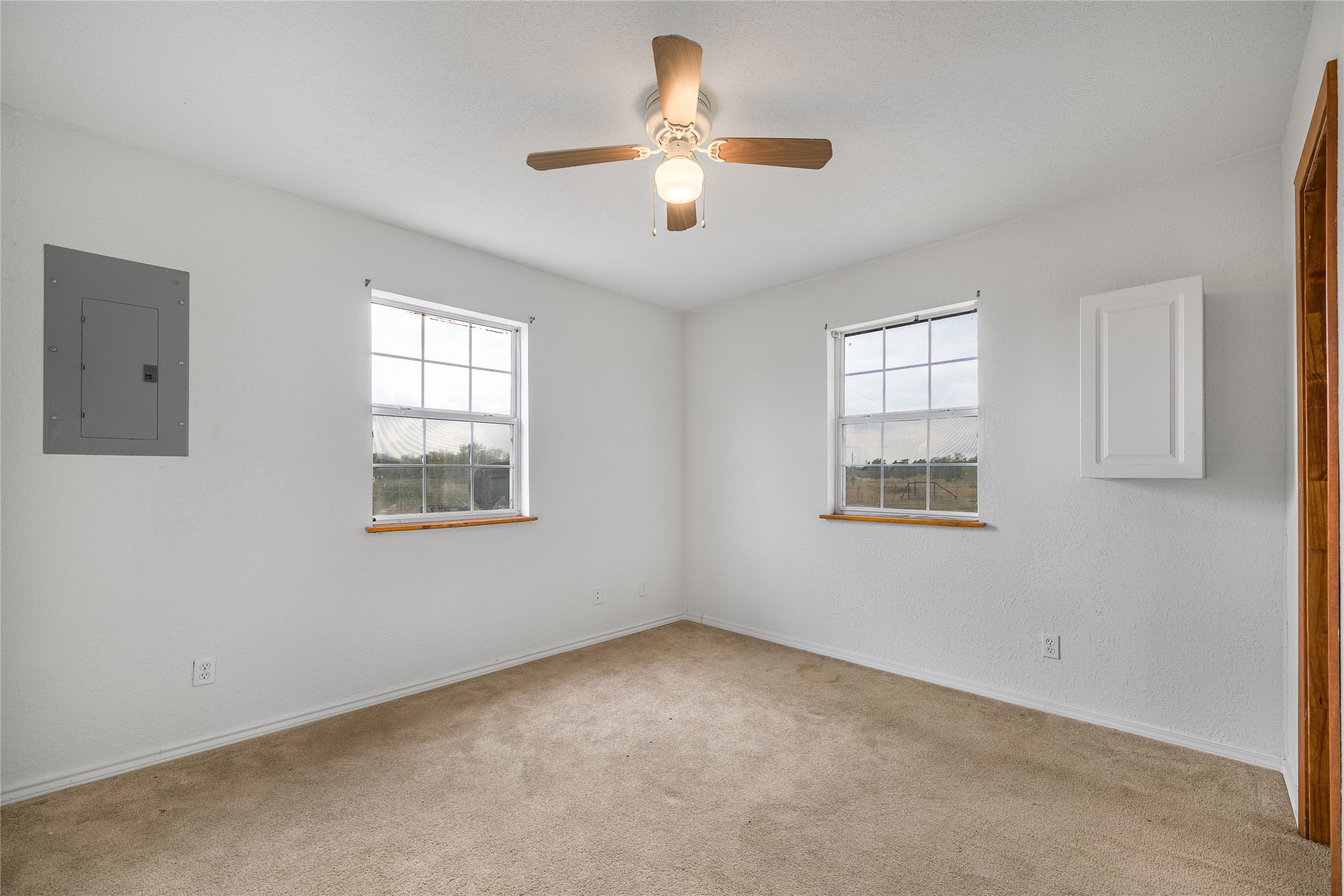174 Easley Road Smithville, TX 78957 - Photo 25 of 28 a view of an empty room with a window