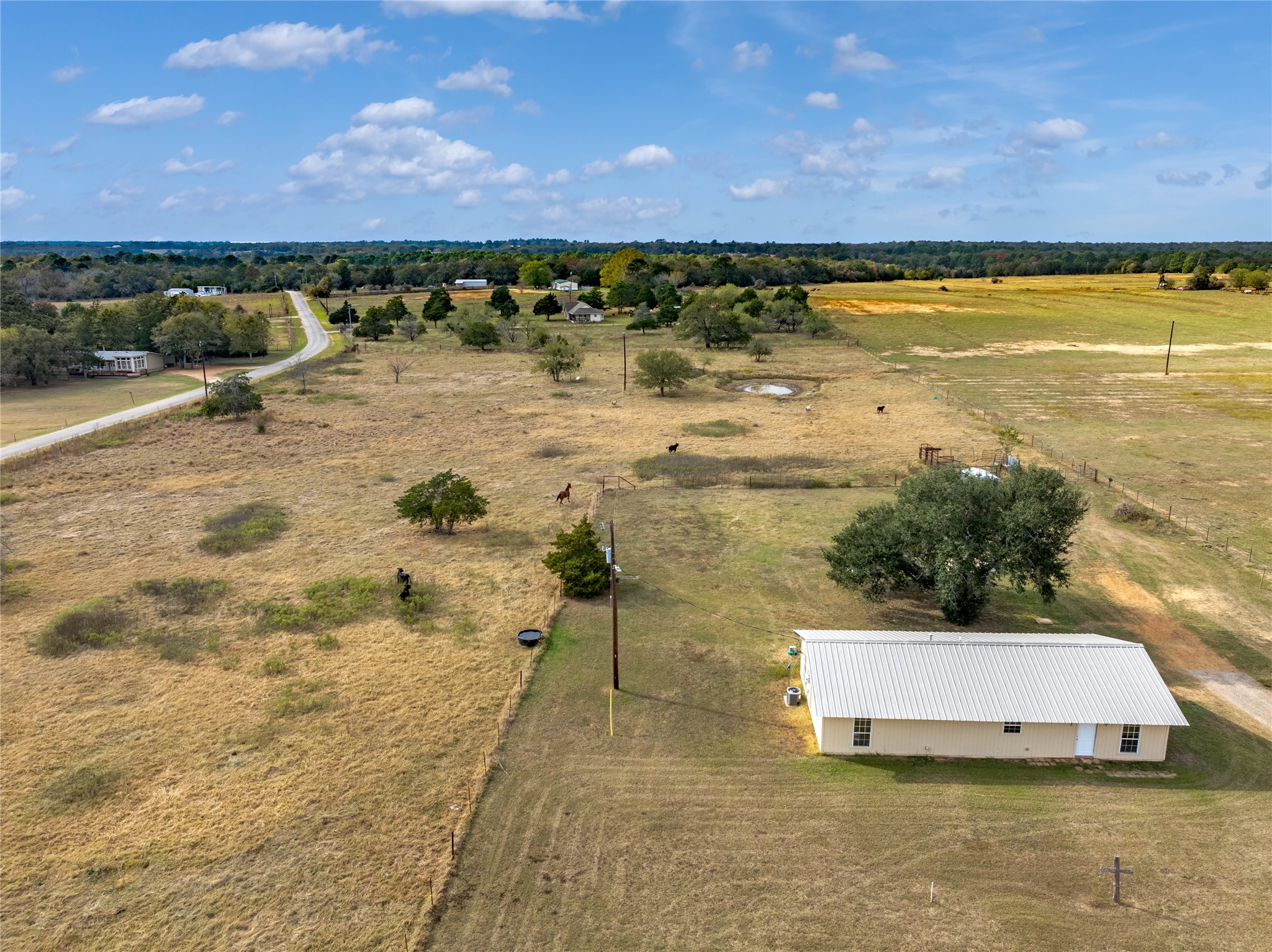 174 Easley Road Smithville, TX 78957 - Photo 4 of 28 a view of a swimming pool and an ocean
