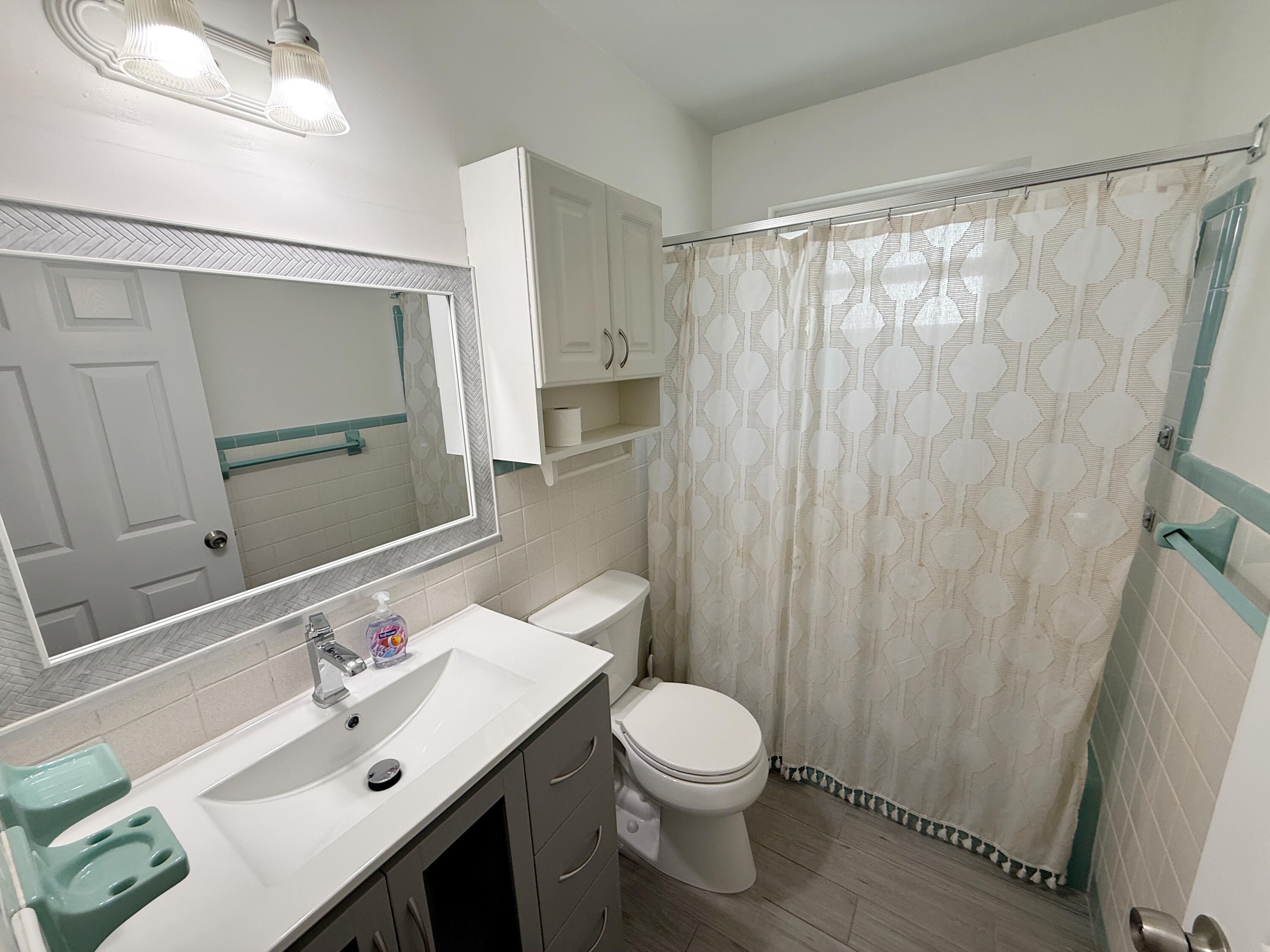 16 Ridgewood Circle Tequesta, FL 33469 - Photo 16 of 25 Guest Bathroom