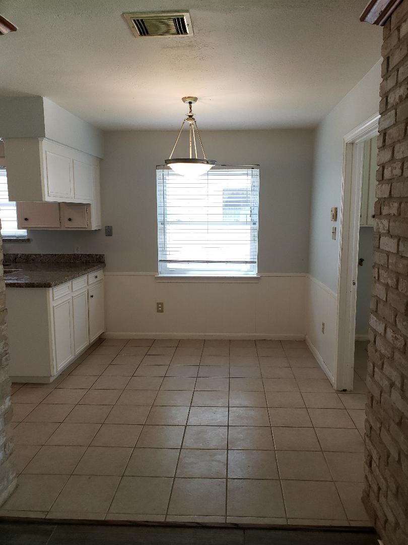 12314 Rincon Drive Houston, TX 77077 - Photo 17 of 36 Large breakfast room is open to kitchen.