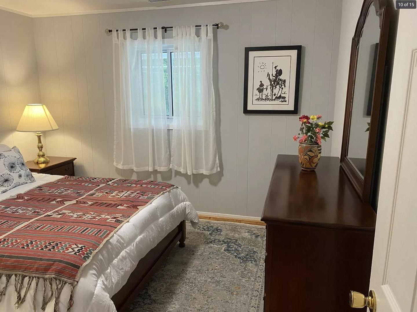 1416 Old Lystra Road, Unit 2 Chapel Hill, NC 27517 - Photo 8 of 12 a bedroom with a bed and a window