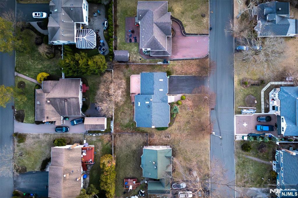 440 Holly Avenue Paramus, NJ 07652 - Photo 3 of 4 an aerial view of houses with outdoor space