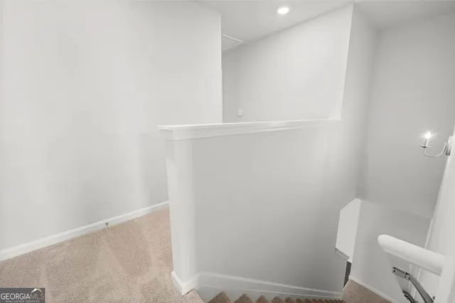 a view of a kitchen with wooden floor and a kitchen