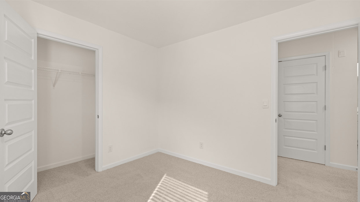265 Sound Circle, Unit 152 Stockbridge, GA 30281 - Photo 36 of 54 a view of an empty room